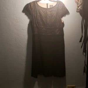 Dress black , nude under